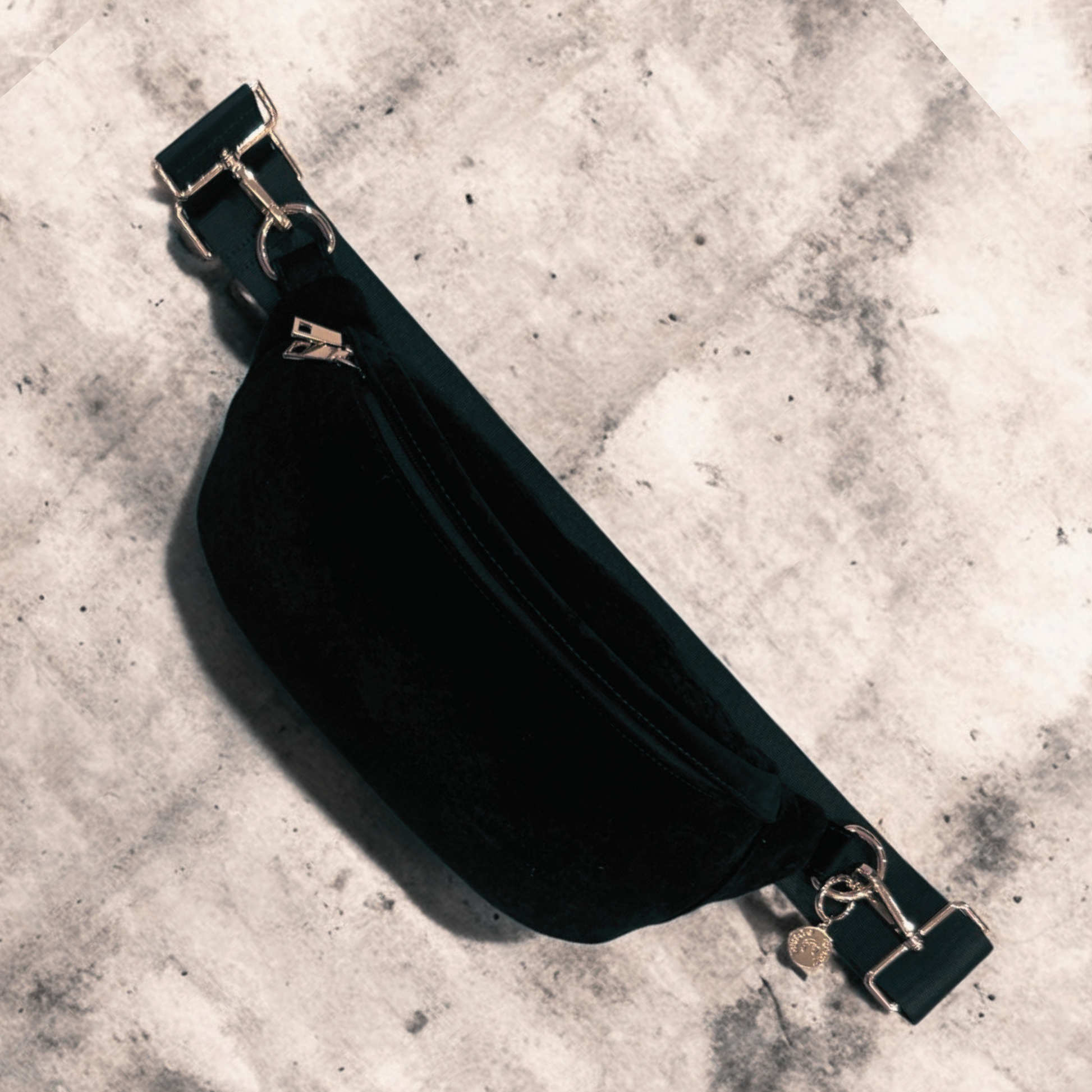 Black crossbody active bag with gold details – Disco Goat.